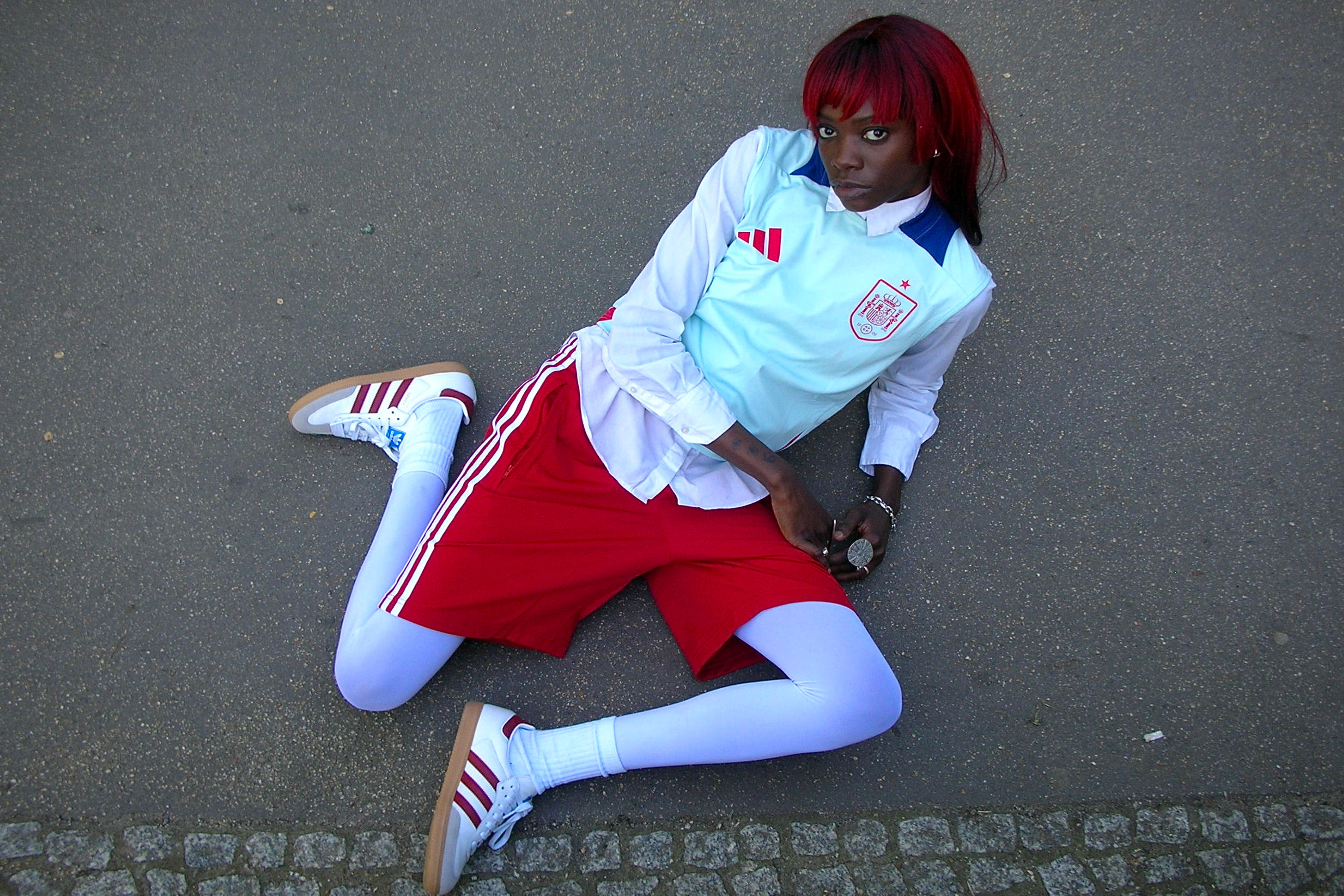 Woman wearing adidas jersey