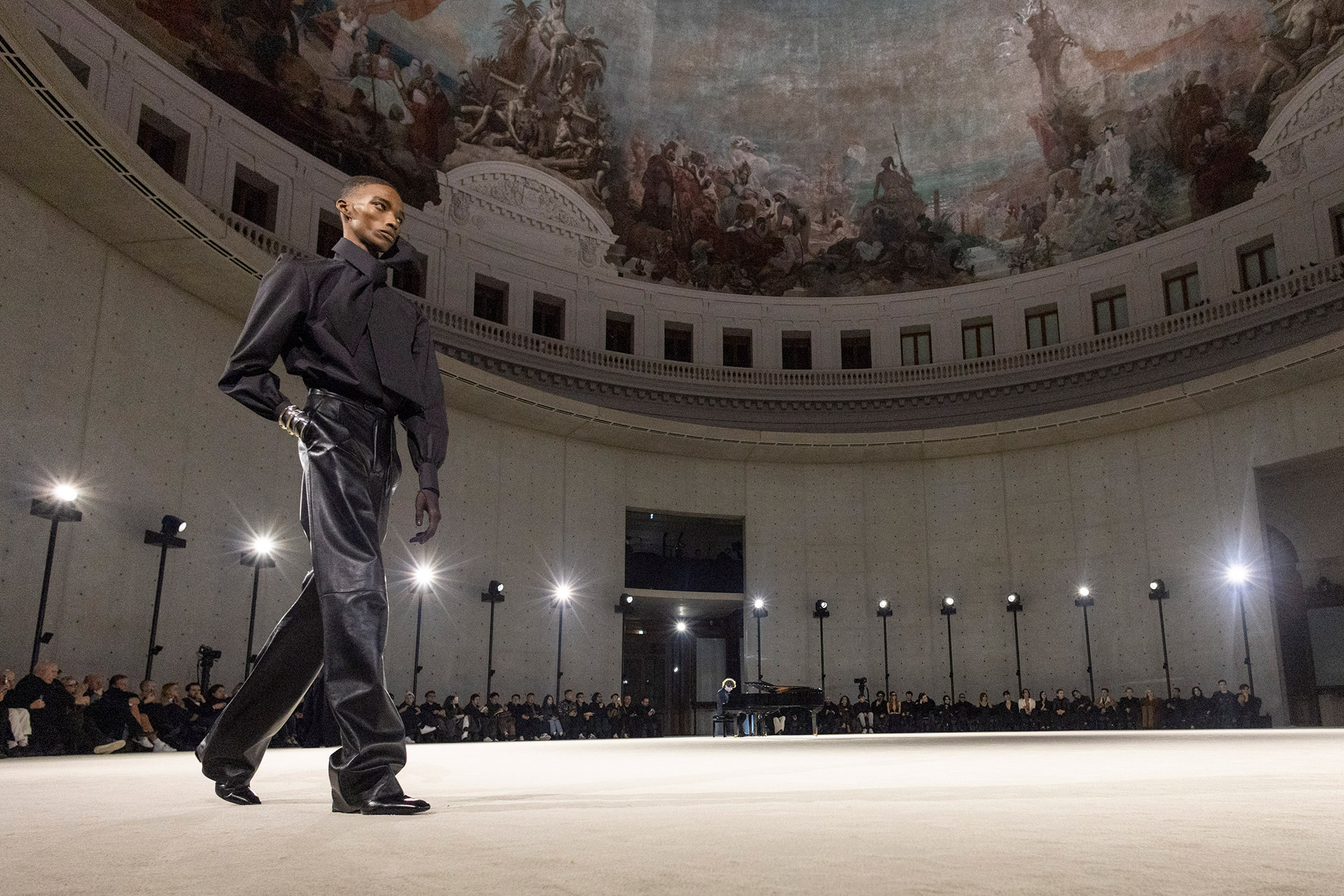 A model walks the runway during the Saint Laurent Menswear Fall-Winter 2023-2024 show as part of Paris Fashion Week on January 17, 2023 in Paris, France.